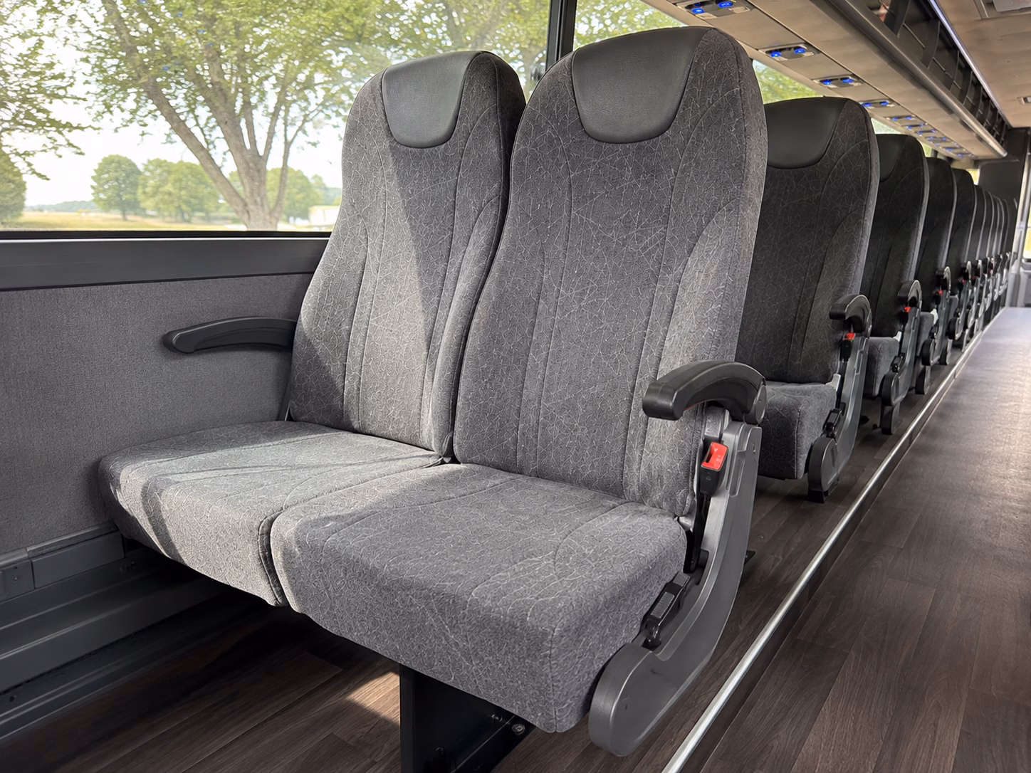 how seasonality and peak times affect charter bus prices in westland michigan
